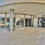 Aura-centro-commerciale-Roma-pavimentazione-pietra-sinterizzata-Duomo-Travertino-Beige