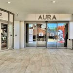 Aura-centro-commerciale-Roma-pavimentazione-pietra-sinterizzata-Duomo-Travertino-Beige