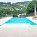 Casa-con-piscina-Bergamo-L'Altra-Pietra-pietra-sinterizzata-Colosseo-Bressa