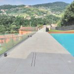 Casa-con-piscina-Bergamo-L'Altra-Pietra-pietra-sinterizzata-Colosseo-Bressa